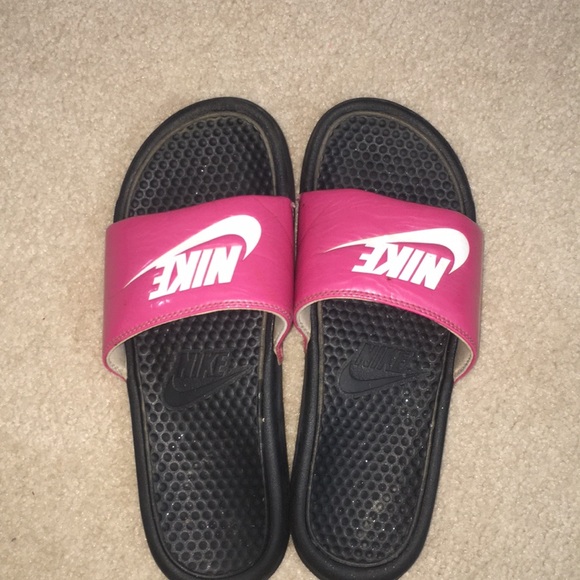 pink and white nike slides